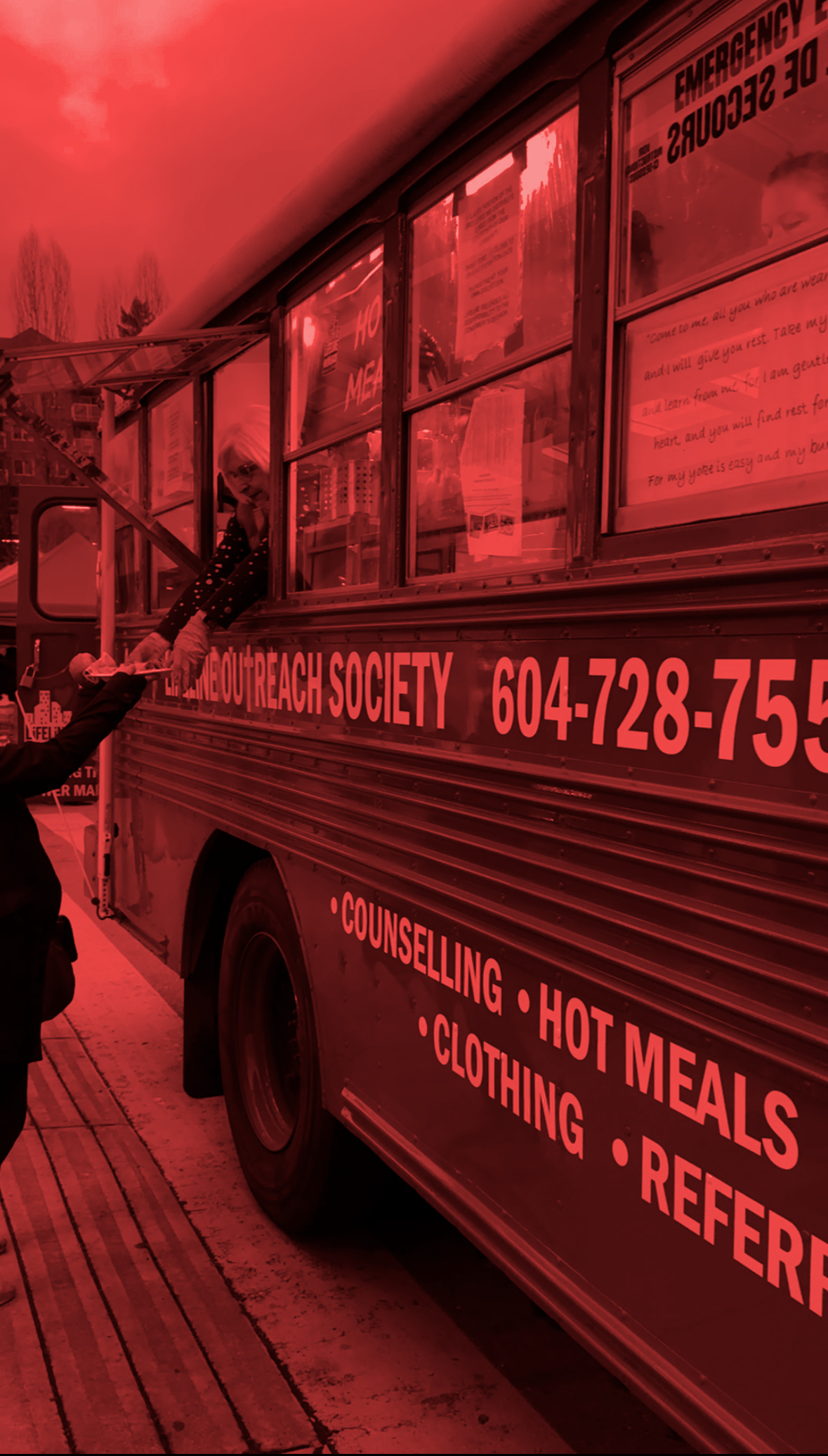 Serving from the window of the Blue Bus